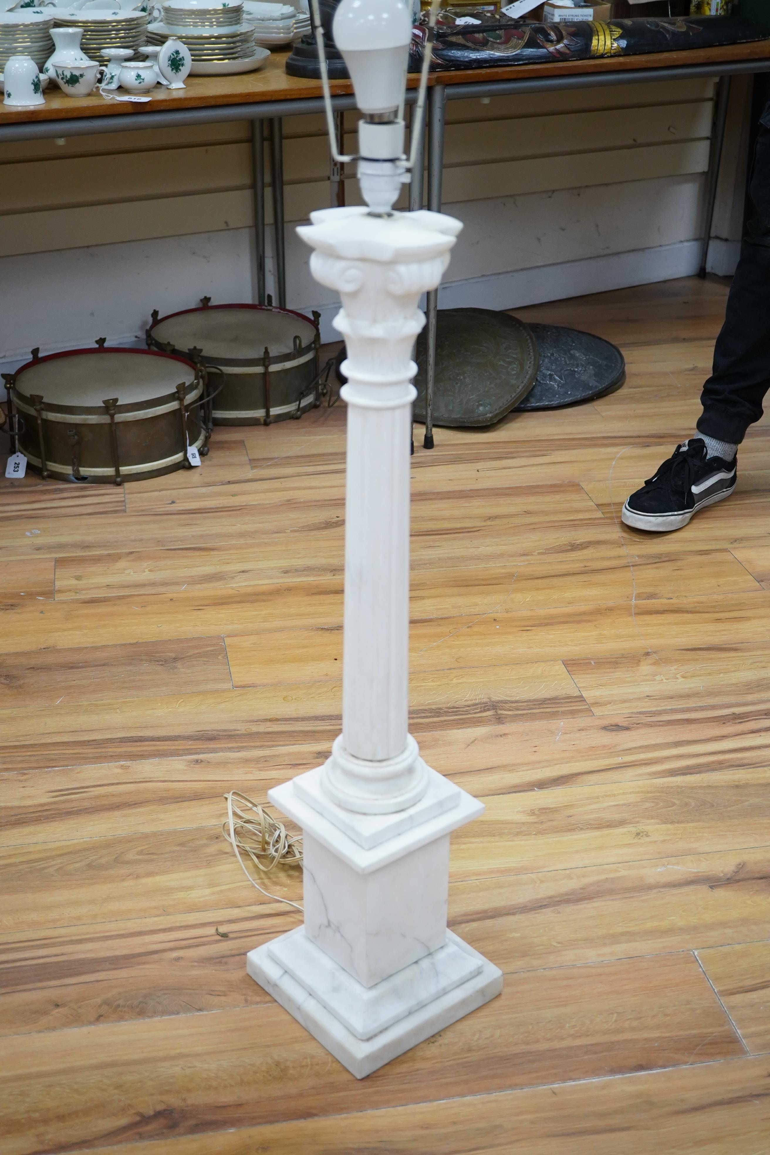 A large white marble Corinthian column table lamp, 80cm high. Condition - small section broken and the reglued to stem